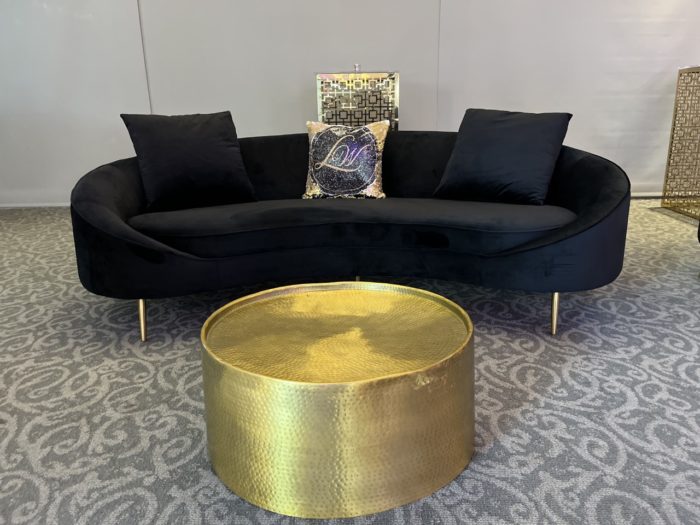 gold table black couch custom pillows